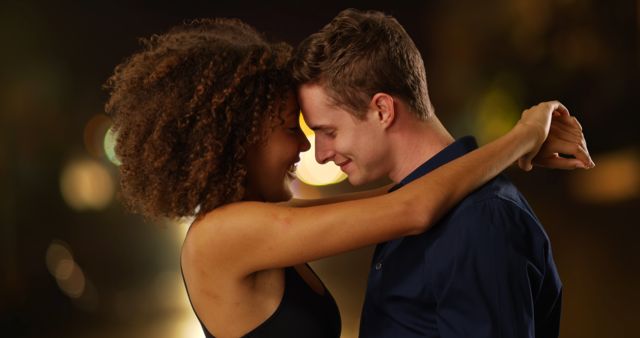 black white couple hugging